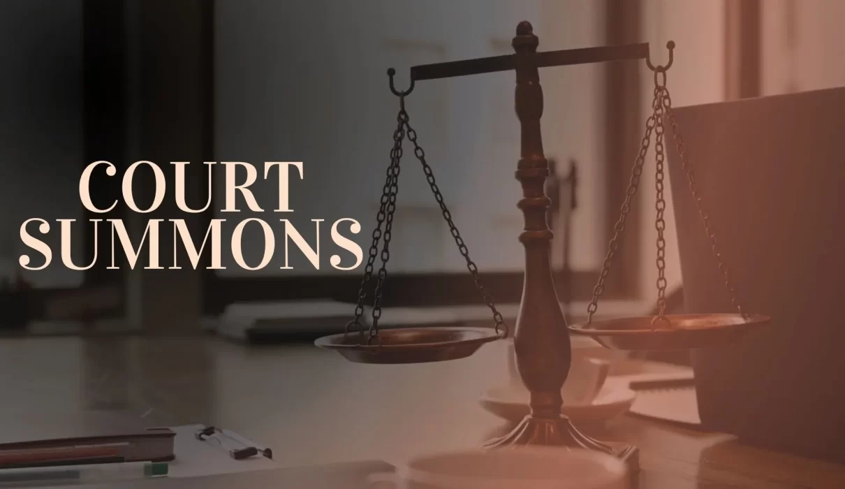 Court summons and legal paperwork
