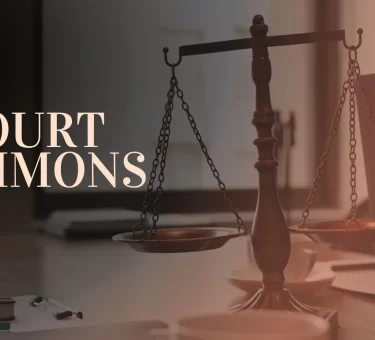 Court summons and legal paperwork